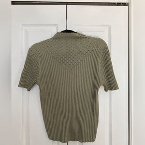 Sage green mock turtleneck knit short sleeve top. Size Large